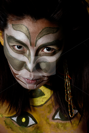 To use this stock image in your creative project, please select the size you need over to the right and click the "Add to Cart" button.
Your downloaded image will come with the Cutcaster watermark removed so don’t worry about the watermark you see on this page. American indian with facepaint stock photo, Stylized amerindian militant drawing on feminine person by Vadim Maier