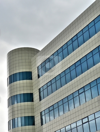 To use this stock image in your creative project, please select the size you need over to the right and click the "Add to Cart" button.
Your downloaded image will come with the Cutcaster watermark removed so don’t worry about the watermark you see on this page. Tower building stock photo, Tower building with sky reflection by Laurent Dambies