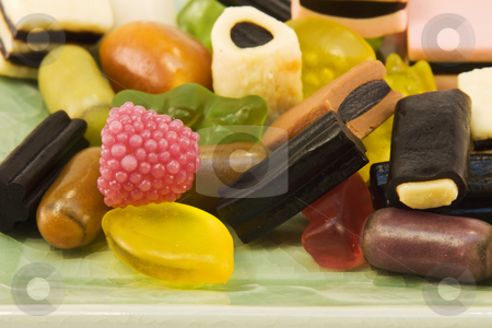 To use this stock image in your creative project, please select the size you need over to the right and click the "Add to Cart" button.
Your downloaded image will come with the Cutcaster watermark removed so don’t worry about the watermark you see on this page. Gummy shapes closeup stock photo, Macro view of gummy shaped candies by Lee Barnwell