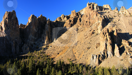 To use this stock image in your creative project, please select the size you need over to the right and click the "Add to Cart" button.
Your downloaded image will come with the Cutcaster watermark removed so don’t worry about the watermark you see on this page. Smith Rock State Park stock photo, by Harold Johnson