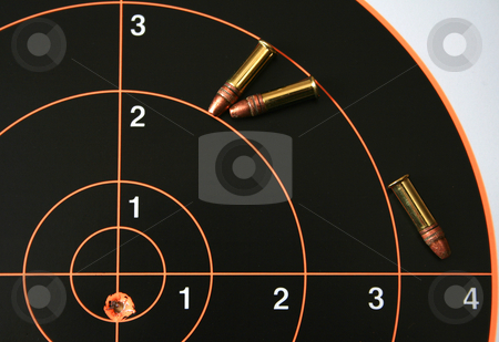 To use this stock image in your creative project, please select the size you need over to the right and click the "Add to Cart" button.
Your downloaded image will come with the Cutcaster watermark removed so don’t worry about the watermark you see on this page. Target shoot 1 stock photo, Target with bullet hole on bullseye plus three .22 caliber bullets. by Clay Anthony