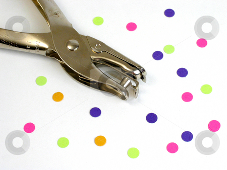 To use this stock image in your creative project, please select the size you need over to the right and click the "Add to Cart" button.
Your downloaded image will come with the Cutcaster watermark removed so don’t worry about the watermark you see on this page. Punchy stock photo, Hole punch laying on white background surrounded by colorful punched paper cirlces. by Clay Anthony