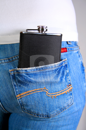 To use this stock image in your creative project, please select the size you need over to the right and click the "Add to Cart" button.
Your downloaded image will come with the Cutcaster watermark removed so don’t worry about the watermark you see on this page. Hip Flask 2 stock photo, Hip flask in reap pocket of woman's jeans. by Clay Anthony
