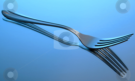 To use this stock image in your creative project, please select the size you need over to the right and click the "Add to Cart" button.
Your downloaded image will come with the Cutcaster watermark removed so don’t worry about the watermark you see on this page. Silverwhere? stock photo, Stainless steel fork reflected on blue mirrored background. by Clay Anthony