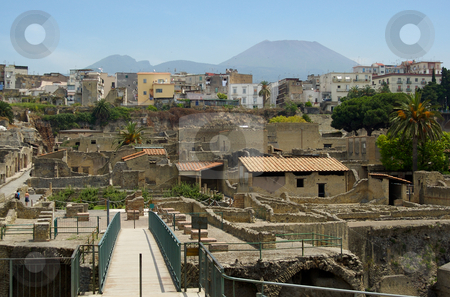 To use this stock image in your creative project, please select the size you need over to the right and click the "Add to Cart" button.
Your downloaded image will come with the Cutcaster watermark removed so don’t worry about the watermark you see on this page. Herculaneum, Ercalano and Vesuvius stock photo, by Mark Smith