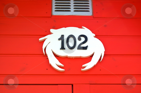 To use this stock image in your creative project, please select the size you need over to the right and click the "Add to Cart" button.
Your downloaded image will come with the Cutcaster watermark removed so don’t worry about the watermark you see on this page. English Beach Hut Number stock photo, by Mark Smith