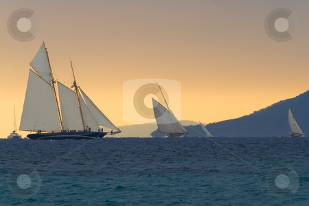 To use this stock image in your creative project, please select the size you need over to the right and click the "Add to Cart" button.
Your downloaded image will come with the Cutcaster watermark removed so don’t worry about the watermark you see on this page. Regattas under storm stock photo, Old sailboats in Cannes bay during