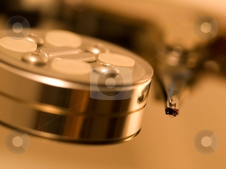 To use this stock image in your creative project, please select the size you need over to the right and click the "Add to Cart" button.
Your downloaded image will come with the Cutcaster watermark removed so don’t worry about the watermark you see on this page. Open hard drive disk closeup stock photo, Macro of an open hard drive disk with focus on the reader tip by Laurent Dambies