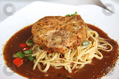 To use this stock image in your creative project, please select the size you need over to the right and click the "Add to Cart" button.
Your downloaded image will come with the Cutcaster watermark removed so don’t worry about the watermark you see on this page. Meat on pasta stock photo, Meat on pasta with sauce fancy cuisine presenation by Kheng Guan Toh
