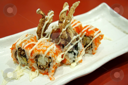 To use this stock image in your creative project, please select the size you need over to the right and click the "Add to Cart" button.
Your downloaded image will come with the Cutcaster watermark removed so don’t worry about the watermark you see on this page. Japanese maki stock photo, Softshell crab maki, traditional japanese rice roll with seafood by Kheng Guan Toh