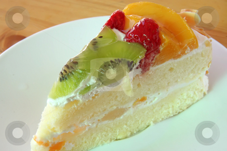 To use this stock image in your creative project, please select the size you need over to the right and click the "Add to Cart" button.
Your downloaded image will come with the Cutcaster watermark removed so don’t worry about the watermark you see on this page. Cream cake stock photo, Cream chiffon cake with fruits and icing by Kheng Guan Toh