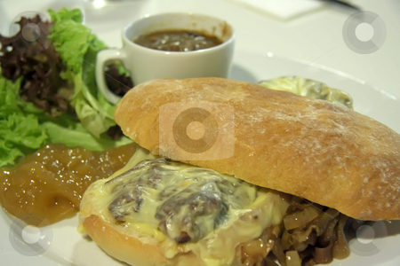 To use this stock image in your creative project, please select the size you need over to the right and click the "Add to Cart" button.
Your downloaded image will come with the Cutcaster watermark removed so don’t worry about the watermark you see on this page. Cheese steak sandwich stock photo, Cheese steak sandwich on ciabata bread fancy restaurant presentation by Kheng Guan Toh