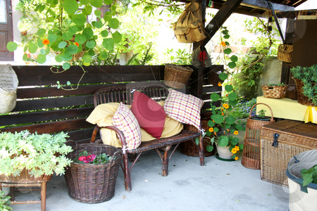 To use this stock image in your creative project, please select the size you need over to the right and click the "Add to Cart" button.
Your downloaded image will come with the Cutcaster watermark removed so don’t worry about the watermark you see on this page. Relaxing summer stock photo, Relaxing summer environment garden furniture shed by Kheng Guan Toh
