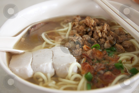 To use this stock image in your creative project, please select the size you need over to the right and click the "Add to Cart" button.
Your downloaded image will come with the Cutcaster watermark removed so don’t worry about the watermark you see on this page. Chinese noodle soup stock photo, Noodles with clear soup traditional chinese cuisine by Kheng Guan Toh