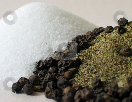 To use this stock image in your creative project, please select the size you need over to the right and click the "Add to Cart" button.
Your downloaded image will come with the Cutcaster watermark removed so don’t worry about the watermark you see on this page. Salt and Peppercorns stock photo, Closeup shot of piles of salt and peppercorns with ground pepper on top. by Clay Anthony