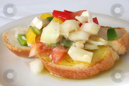 To use this stock image in your creative project, please select the size you need over to the right and click the "Add to Cart" button.
Your downloaded image will come with the Cutcaster watermark removed so don’t worry about the watermark you see on this page. Bruschetta appetizer stock photo, Bruschetta traditional Italian appetizer with chopped vegetables on bread by Kheng Guan Toh