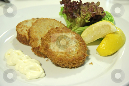 To use this stock image in your creative project, please select the size you need over to the right and click the "Add to Cart" button.
Your downloaded image will come with the Cutcaster watermark removed so don’t worry about the watermark you see on this page. Crab cakes stock photo, Fried crab cake appetizers with lettuce and mayonaisse by Kheng Guan Toh