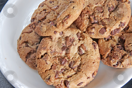 To use this stock image in your creative project, please select the size you need over to the right and click the "Add to Cart" button.
Your downloaded image will come with the Cutcaster watermark removed so don’t worry about the watermark you see on this page. Chocolate chip cookies stock photo, Chocolate chip cookies arranged on white plate by Kheng Guan Toh