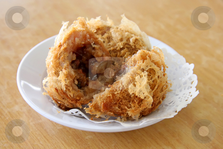 To use this stock image in your creative project, please select the size you need over to the right and click the "Add to Cart" button.
Your downloaded image will come with the Cutcaster watermark removed so don’t worry about the watermark you see on this page. Fried dimsum stock photo, Fried dimsum traditional chinese tidbits snack breakfast by Kheng Guan Toh