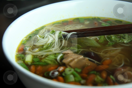 To use this stock image in your creative project, please select the size you need over to the right and click the "Add to Cart" button.
Your downloaded image will come with the Cutcaster watermark removed so don’t worry about the watermark you see on this page. Herbal soup stock photo, Noodles in herbal soup traditional chinese cuisine by Kheng Guan Toh