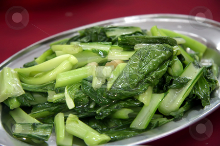 To use this stock image in your creative project, please select the size you need over to the right and click the "Add to Cart" button.
Your downloaded image will come with the Cutcaster watermark removed so don’t worry about the watermark you see on this page. Fried asian vegetables stock photo, Plate of fried green leafy vegetables Asian cuisine by Kheng Guan Toh