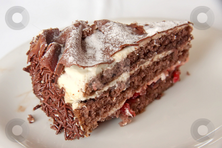 To use this stock image in your creative project, please select the size you need over to the right and click the "Add to Cart" button.
Your downloaded image will come with the Cutcaster watermark removed so don’t worry about the watermark you see on this page. Black forest cake stock photo, Chocolate black forest cake slice on white plate by Kheng Guan Toh
