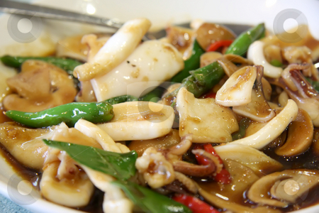 To use this stock image in your creative project, please select the size you need over to the right and click the "Add to Cart" button.
Your downloaded image will come with the Cutcaster watermark removed so don’t worry about the watermark you see on this page. Spicy squid stock photo, Spicy squid traditional thai cuisine seafood dish by Kheng Guan Toh