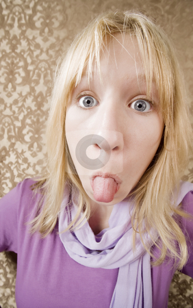 To use this stock image in your creative project, please select the size you need over to the right and click the "Add to Cart" button.
Your downloaded image will come with the Cutcaster watermark removed so don’t worry about the watermark you see on this page. Young girl sticking out her tongue stock photo, Pretty young girl sticking out her tongue by Scott Griessel