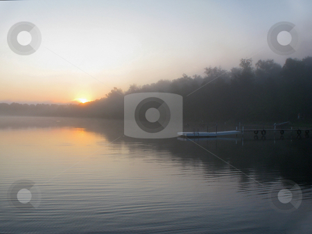 To use this stock image in your creative project, please select the size you need over to the right and click the "Add to Cart" button.
Your downloaded image will come with the Cutcaster watermark removed so don’t worry about the watermark you see on this page. Fishing pier at dawn sunrise stock photo, It won't be this quiet for long before the fishing and water activities begin at this pier on Cutfoot Sioux Lake at sunrise by Bruce Peterson