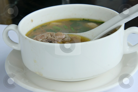 To use this stock image in your creative project, please select the size you need over to the right and click the "Add to Cart" button.
Your downloaded image will come with the Cutcaster watermark removed so don’t worry about the watermark you see on this page. Oxtail soup stock photo, Spicy oxtail soup with vegetables in white bowl by Kheng Guan Toh