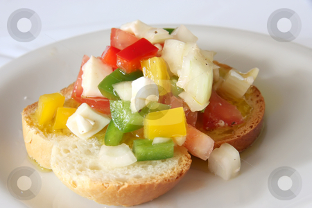 To use this stock image in your creative project, please select the size you need over to the right and click the "Add to Cart" button.
Your downloaded image will come with the Cutcaster watermark removed so don’t worry about the watermark you see on this page. Bruschetta appetizer stock photo, Bruschetta traditional Italian appetizer with chopped vegetables on bread by Kheng Guan Toh