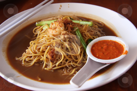 To use this stock image in your creative project, please select the size you need over to the right and click the "Add to Cart" button.
Your downloaded image will come with the Cutcaster watermark removed so don’t worry about the watermark you see on this page. Chinese noodles stock photo, Traditional chinese noodles with soy sauce and seafood by Kheng Guan Toh