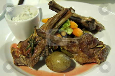 To use this stock image in your creative project, please select the size you need over to the right and click the "Add to Cart" button.
Your downloaded image will come with the Cutcaster watermark removed so don’t worry about the watermark you see on this page. Lamb chop stock photo, Grilled lamb chop with brocolli and vegetables by Kheng Guan Toh