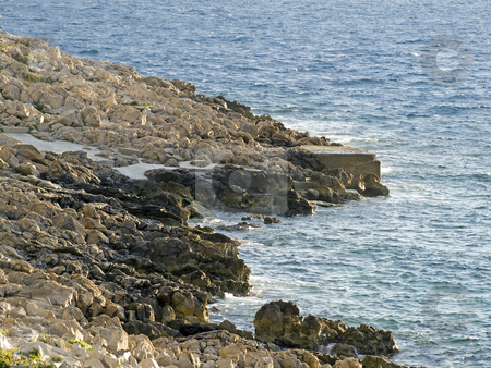 To use this stock image in your creative project, please select the size you need over to the right and click the "Add to Cart" button.
Your downloaded image will come with the Cutcaster watermark removed so don’t worry about the watermark you see on this page. Adriatic Coast stock photo, Stone coast somewhere at the Adriatic sea. by Sinisa Botas