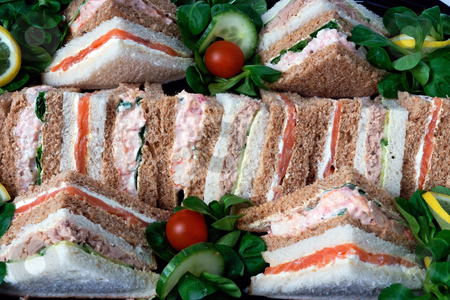 To use this stock image in your creative project, please select the size you need over to the right and click the "Add to Cart" button.
Your downloaded image will come with the Cutcaster watermark removed so don’t worry about the watermark you see on this page. Platter of sandwiches stock photo, A group of sandwiches cut into triangles for a business lunch by Paul Phillips