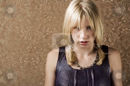 To use this stock image in your creative project, please select the size you need over to the right and click the "Add to Cart" button.
Your downloaded image will come with the Cutcaster watermark removed so don’t worry about the watermark you see on this page. Pouting teenage girl stock photo, Pretty young girl with blonde hair pouting by Scott Griessel