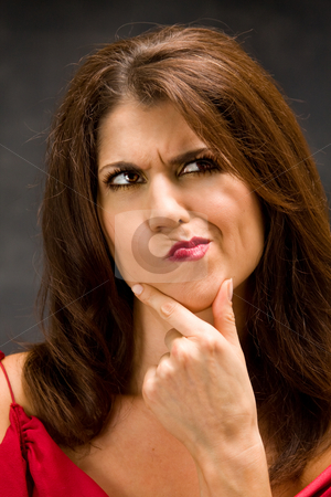To use this stock image in your creative project, please select the size you need over to the right and click the "Add to Cart" button.
Your downloaded image will come with the Cutcaster watermark removed so don’t worry about the watermark you see on this page. Thinking woman stock photo, The beautiful face of a thinking woman with hand on chin by Paul Hakimata