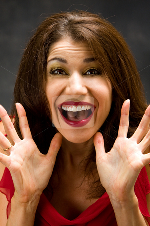 To use this stock image in your creative project, please select the size you need over to the right and click the "Add to Cart" button.
Your downloaded image will come with the Cutcaster watermark removed so don’t worry about the watermark you see on this page. Ecstatic stock photo, Happy woman with red lips by Paul Hakimata