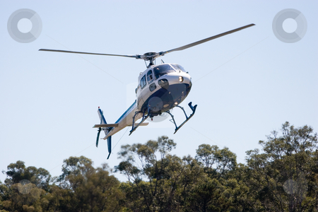 To use this stock image in your creative project, please select the size you need over to the right and click the "Add to Cart" button.
Your downloaded image will come with the Cutcaster watermark removed so don’t worry about the watermark you see on this page. Helicopter stock photo, Helicopter in flight by Nicholas Rjabow