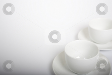 To use this stock image in your creative project, please select the size you need over to the right and click the "Add to Cart" button.
Your downloaded image will come with the Cutcaster watermark removed so don’t worry about the watermark you see on this page. Coffee Cups stock photo, Two coffee cups on the right-hand side of a white background. Gradient light drop off in the bottom of the frame. by Steve Smith