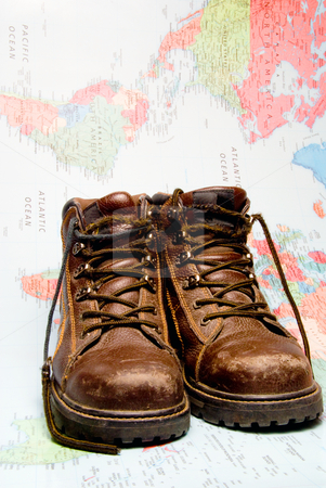 To use this stock image in your creative project, please select the size you need over to the right and click the "Add to Cart" button.
Your downloaded image will come with the Cutcaster watermark removed so don’t worry about the watermark you see on this page. Traveling Shoes stock photo, The shoes of a world traveler ready for a trek. by Robert Byron