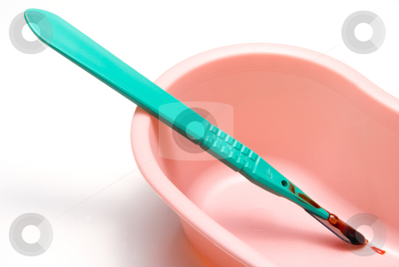 To use this stock image in your creative project, please select the size you need over to the right and click the "Add to Cart" button.
Your downloaded image will come with the Cutcaster watermark removed so don’t worry about the watermark you see on this page. Scalpel stock photo, A medical scalpel after a surgical procedure. by Robert Byron