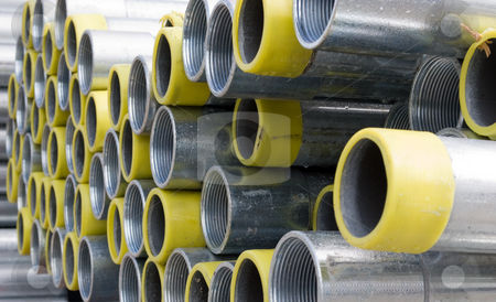 To use this stock image in your creative project, please select the size you need over to the right and click the "Add to Cart" button.
Your downloaded image will come with the Cutcaster watermark removed so don’t worry about the watermark you see on this page. Pipes stock photo, Construction pipes with yellow tips stacked together by Robert Cabrera