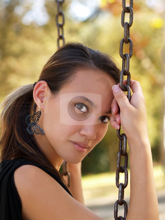 To use this stock image in your creative project, please select the size you need over to the right and click the "Add to Cart" button.
Your downloaded image will come with the Cutcaster watermark removed so don’t worry about the watermark you see on this page. Woman on swing stock photo, Young asian american woman sitting on swing with chains by Jeff Cleveland