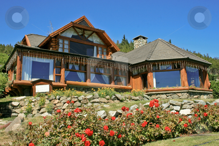 To use this stock image in your creative project, please select the size you need over to the right and click the "Add to Cart" button.
Your downloaded image will come with the Cutcaster watermark removed so don’t worry about the watermark you see on this page. Beautiful wooden house stock photo, Living in a charming wooden house in Bariloche, Argentina. by Rafael Franceschini