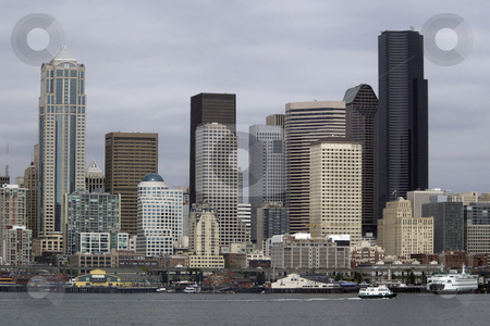 To use this stock image in your creative project, please select the size you need over to the right and click the "Add to Cart" button.
Your downloaded image will come with the Cutcaster watermark removed so don’t worry about the watermark you see on this page. Seattle Washington stock photo, July 22, 2008: The Seattle skyline and Ferry Terminal could be scene from the Walla Walla Washington State Ferry as it left Seattle and heading to Bremerton, Washington. by Jesse Beals