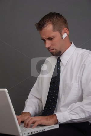 To use this stock image in your creative project, please select the size you need over to the right and click the "Add to Cart" button.
Your downloaded image will come with the Cutcaster watermark removed so don’t worry about the watermark you see on this page. Man at Work stock photo, Young man working by Timothy OLeary