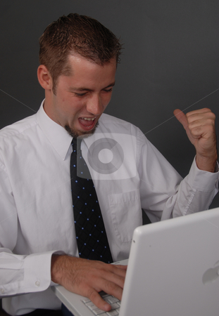 To use this stock image in your creative project, please select the size you need over to the right and click the "Add to Cart" button.
Your downloaded image will come with the Cutcaster watermark removed so don’t worry about the watermark you see on this page. Man on Laptop stock photo, by Timothy OLeary