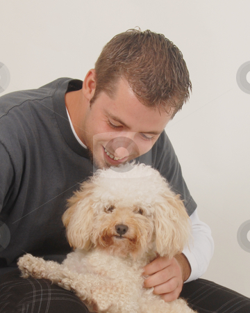 To use this stock image in your creative project, please select the size you need over to the right and click the "Add to Cart" button.
Your downloaded image will come with the Cutcaster watermark removed so don’t worry about the watermark you see on this page. Man and Dog stock photo, by Timothy OLeary