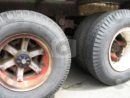 To use this stock image in your creative project, please select the size you need over to the right and click the "Add to Cart" button.
Your downloaded image will come with the Cutcaster watermark removed so don’t worry about the watermark you see on this page. Large truck tires stock photo, Large truck tires by Mbudley Mbudley